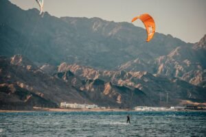 Kitesurfers on the Red Sea in front of the Sinai mountains