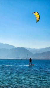 Hazy blue mountains behind the Red Sea coast