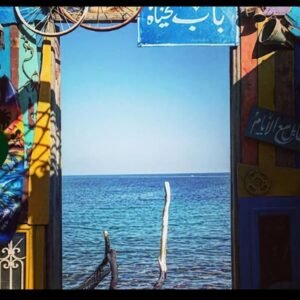 A painted doorway looking out to the Red Sea