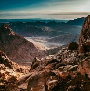 Rocky canyon above a desert valley in South Sinai