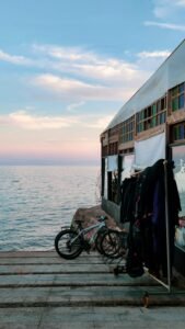 Seaside building with bicycles by the Red Sea at dusk
